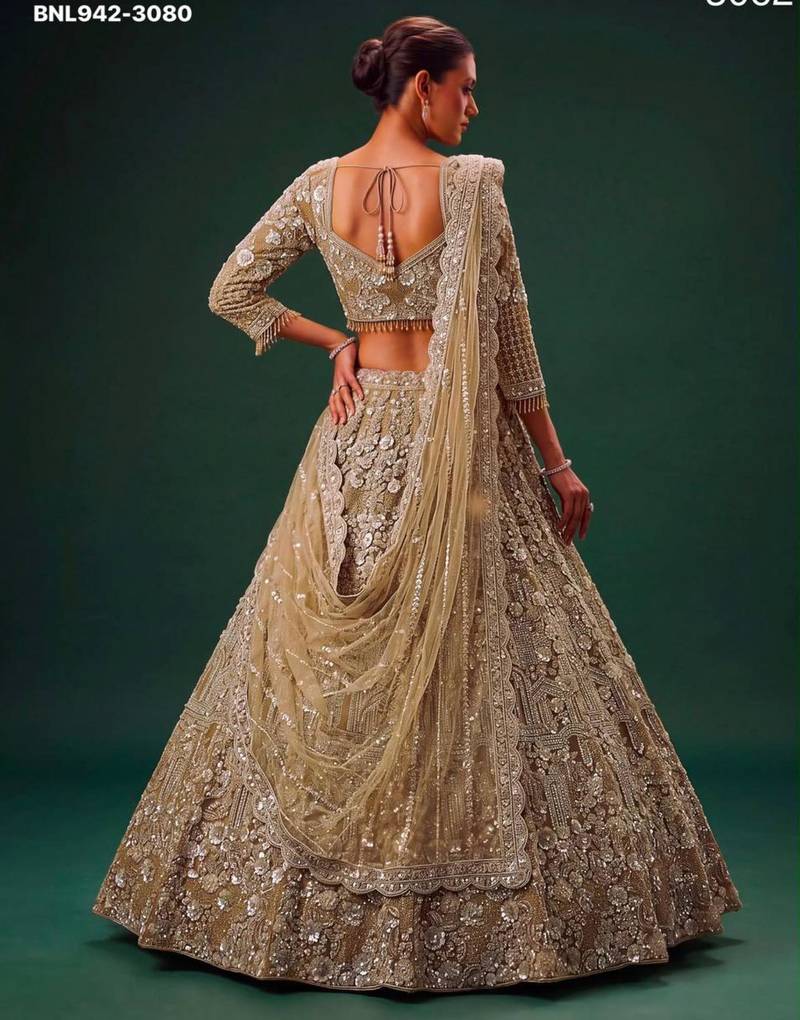 Beige Net Heavily Embroidered Royal Bridal Reception Lehenga Choli Set