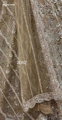 Beige Net Heavily Embroidered Royal Bridal Reception Lehenga Choli Set 3