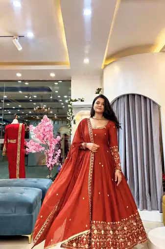 Orange heavily embroidered anarkali suit set