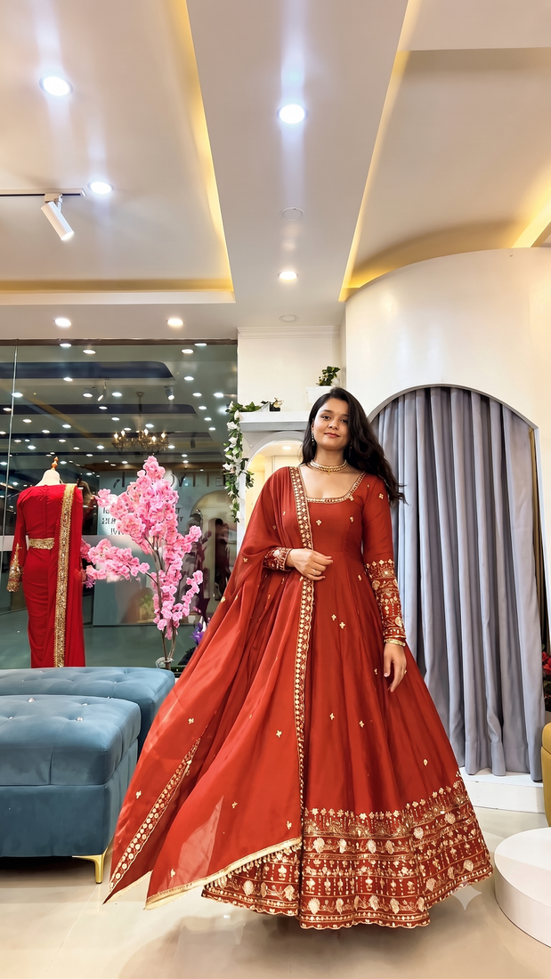Orange heavily embroidered anarkali suit set