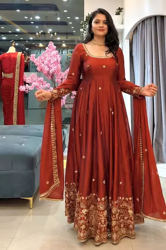 Orange heavily embroidered anarkali suit set