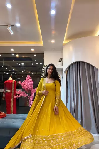 Yellow heavily embroidered anarkali suit set
