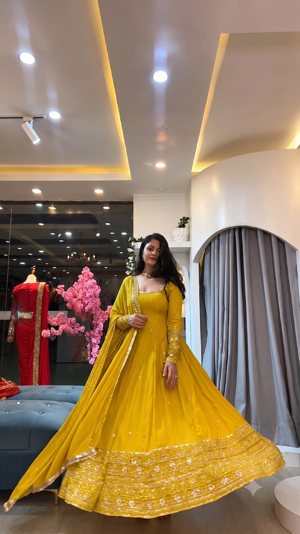 Yellow heavily embroidered anarkali suit set