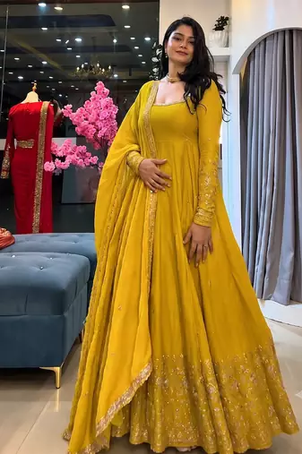 Yellow heavily embroidered anarkali suit set