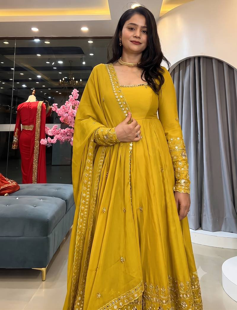 Yellow heavily embroidered anarkali suit set