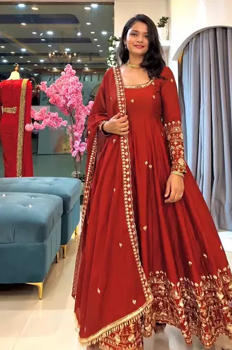 Orange heavily embroidered anarkali suit set