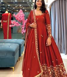 Orange heavily embroidered anarkali suit set