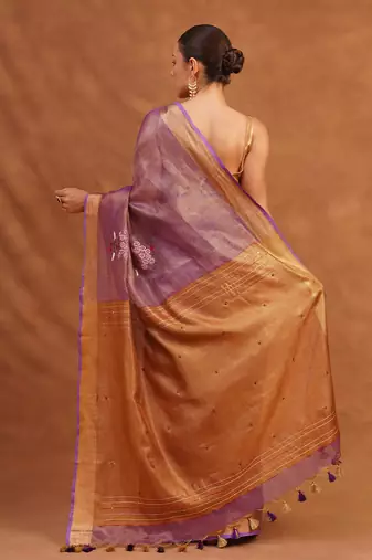Purple embroidered tissue linen saree