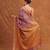 Purple embroidered tissue linen saree