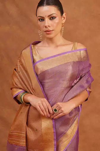 Purple embroidered tissue linen saree