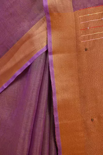 Purple embroidered tissue linen saree