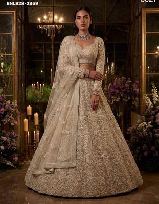 Beige Net Heavily Embroidered Bridal Reception Lehenga Choli Set 1