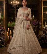 Beige Net Heavily Embroidered Bridal Reception Lehenga Choli Set