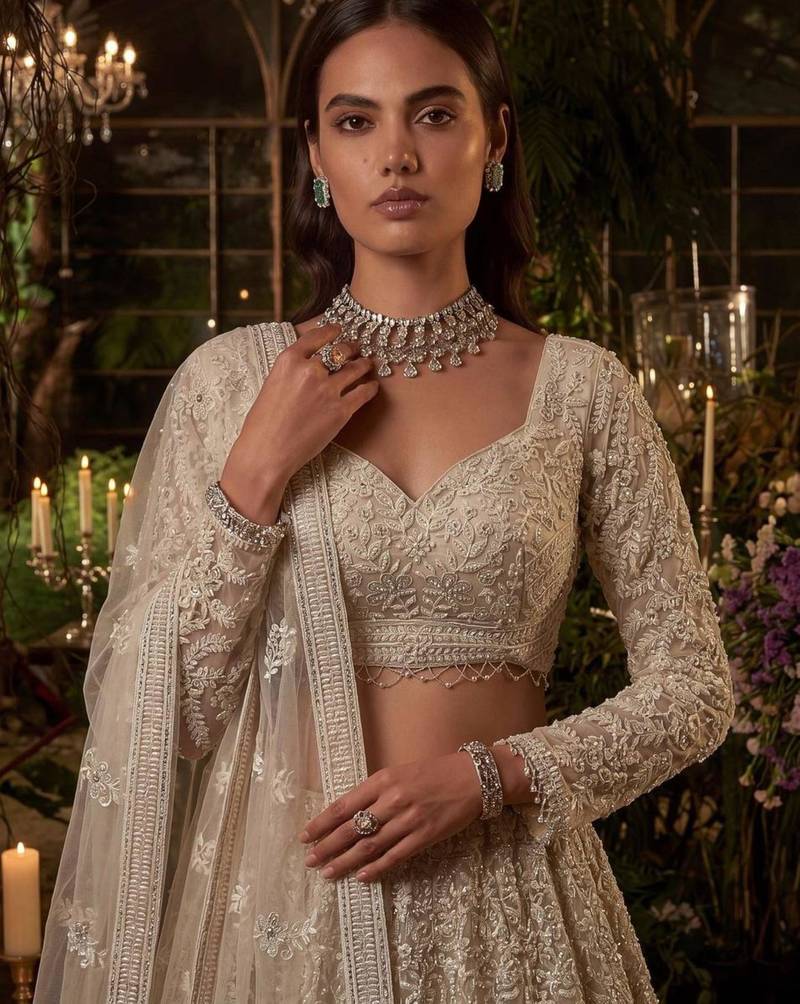 Beige Net Heavily Embroidered Bridal Reception Lehenga Choli Set