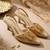 gold embroidered pointed toe kitten heels