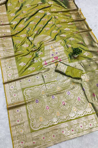 Green soft silk blend saree with zari weaving meenakari design