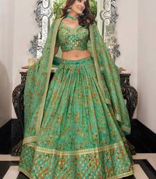 green organza embroidered lehenga choli