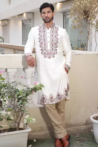 Ivory embroidered festive kurta with placket and hem detailing for men