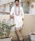 Ivory embroidered festive kurta with placket and hem detailing for men