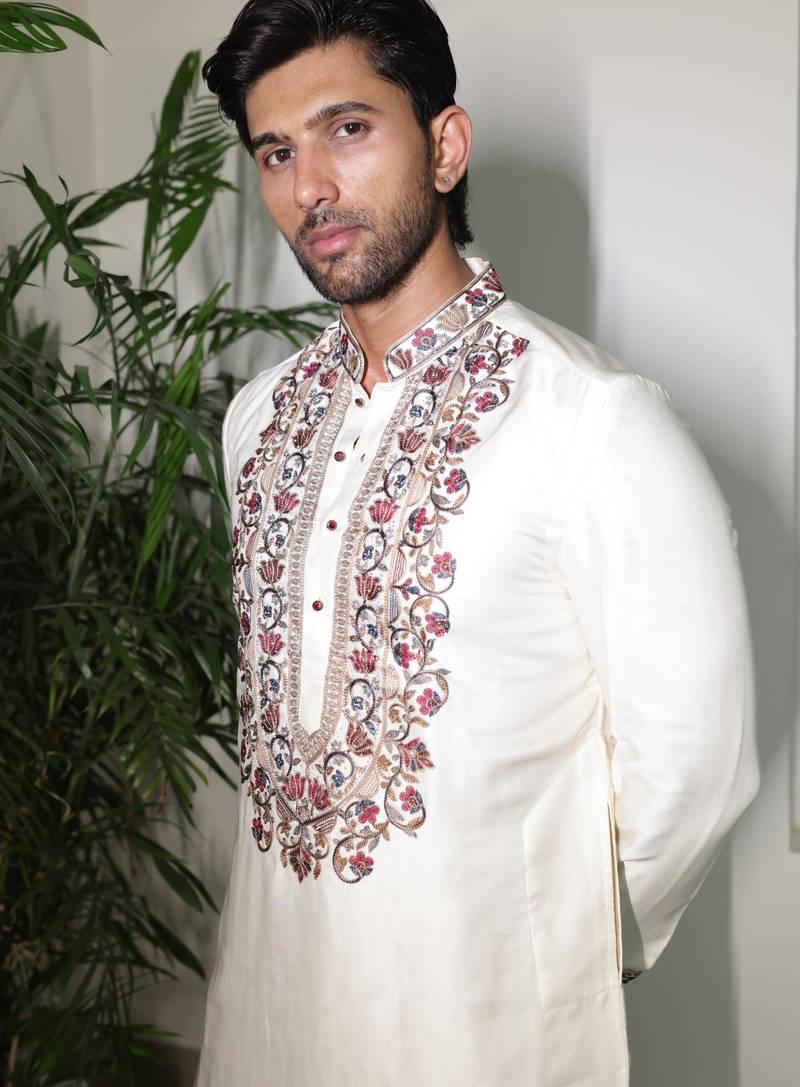 Ivory embroidered festive kurta with placket and hem detailing for men