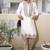 Ivory embroidered festive kurta with placket and hem detailing for men