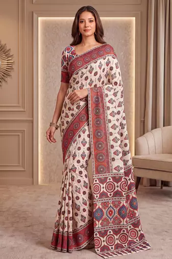 Cream ajrakh print crepe silk blend saree with mirror work blouse