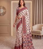 Cream ajrakh print crepe silk blend saree with mirror work blouse
