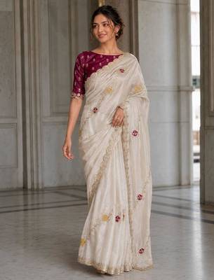Off white fendy satin silk blend embroidered saree with cutwork border 1