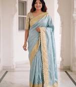 Blue kanjivaram silk blend embroidered saree with unstitched blouse