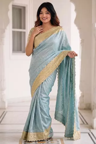 Blue kanjivaram silk blend embroidered saree with unstitched blouse