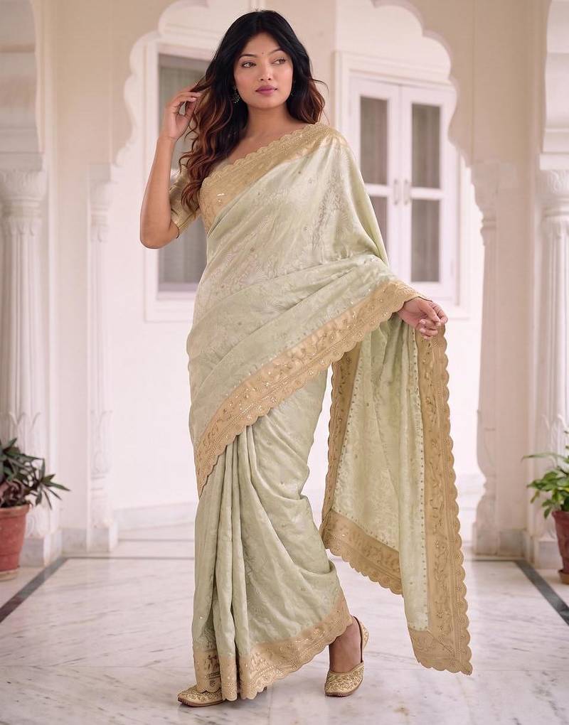 Sea green kanjivaram silk blend embroidered saree with unstitched blouse
