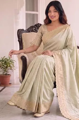 Sea green kanjivaram silk blend embroidered saree with unstitched blouse