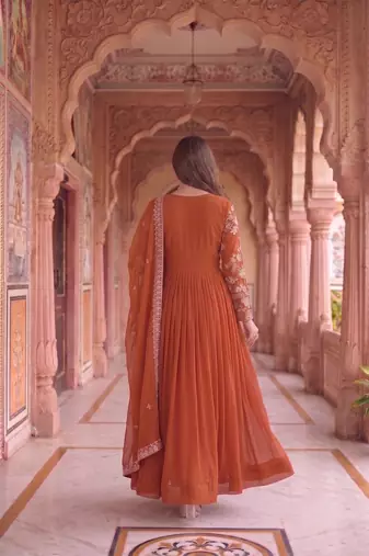 Rust colour georgette ethnic ceremonial wedding reception gown