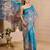 Sky blue cotton blend floral print saree with blouse