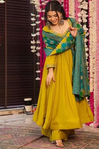 Mustard color pv chanderi fabric designer embroidery work fancy graceful partywear suit