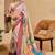 Cream cotton blend floral print saree with blouse