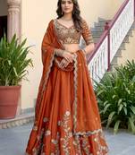 Rust Color Smart Bridesmaid Rangoli Silk Lehenga Choli For Trendy Wedding Looks