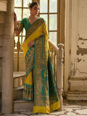 Saffron Yellow Ethnic Motifs Woven Design Zari Banarasi Silk Sarees 1