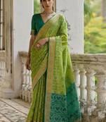 Ethnic Motifs Woven Design Zari Ikkat Silk Sarees