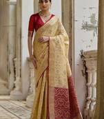 Light Cream Ethnic Motifs Woven Design Zari Ikkat Silk Sarees