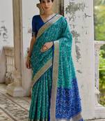 Teal Firozi Woven Design Zari Ikat Saree