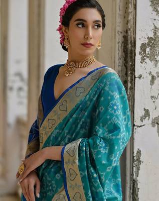 Teal Firozi Woven Design Zari Ikat Saree 4