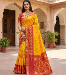 Yellow soft silk blend pochampalli saree with zari weaving meenakari design