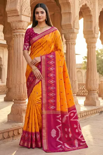 Orange soft silk blend pochampalli saree with zari weaving meenakari design