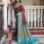 Woven Design Ajrak Printed Zari Ikat Saree With Tassels