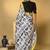 Black color smart and designer printed ready to wear satin saree