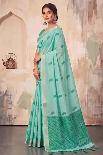 teal green color cotton blend woven resham designer fancy festive saree