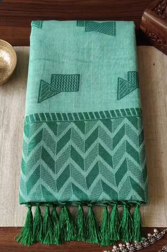 teal green color cotton blend woven resham designer fancy festive saree
