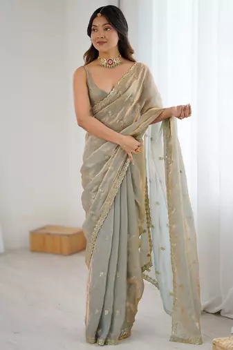 beige color silk blend  bollywood style glamorous ceremonial saree