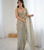 beige color silk blend  bollywood style glamorous ceremonial saree